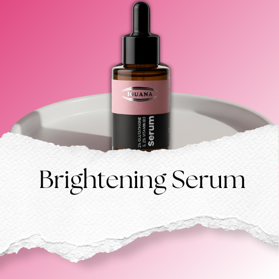 Iguana brightening face serum bottle next to green leaves – natural skincare concept.